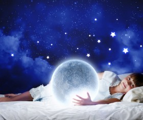 Holding a little girl with a crystal ball Stock Photo