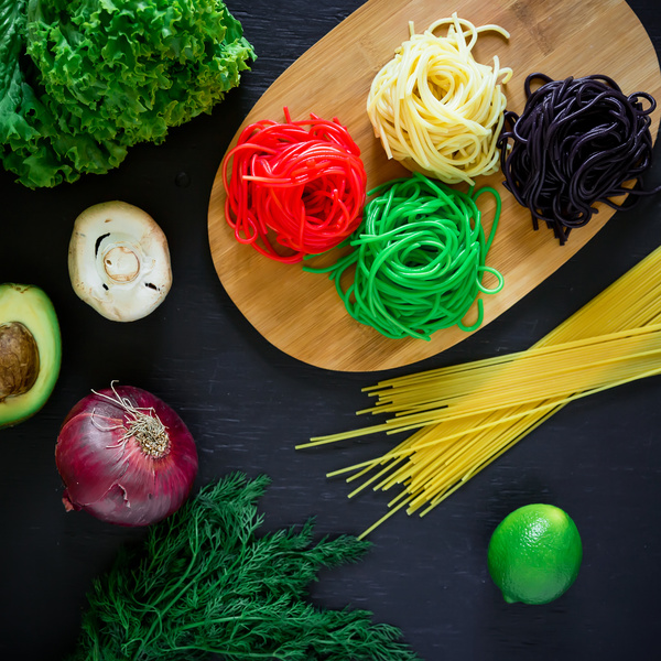 Italian colorful pasta with onions Stock Photo