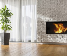 Living room fireplace with large plants Stock Photo
