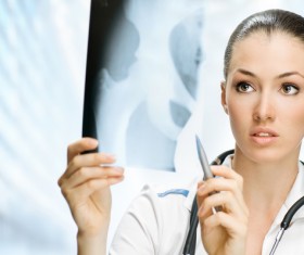 Look at the X-ray female doctor Stock Photo
