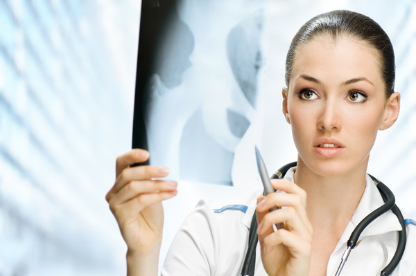 Look at the X-ray female doctor Stock Photo