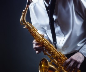 Man blowing saxophone Stock Photo