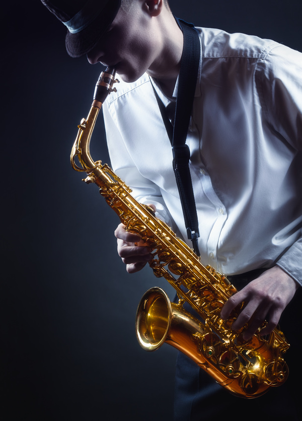 Man blowing saxophone Stock Photo
