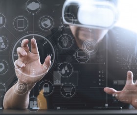 Men with VR glasses touch the virtual screen Stock Photo 02