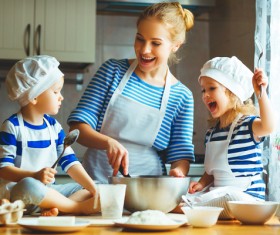 Mother and Child in the kitchen cooking Stock Photo