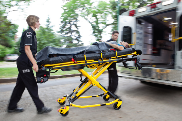 Push the patient on the ambulance Stock Photo