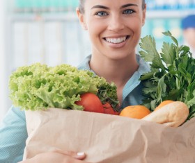 Smiling lady to buy food Stock Photo