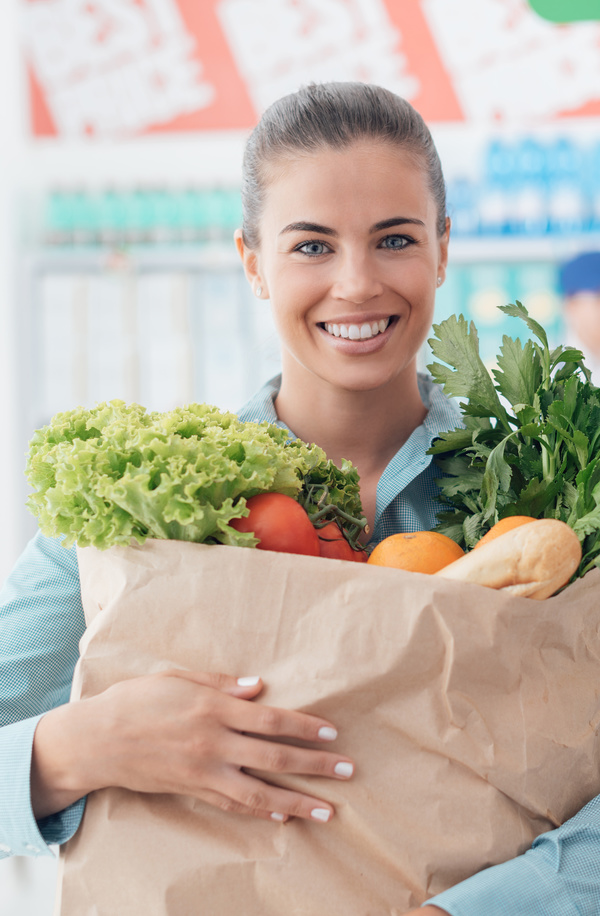 Smiling lady to buy food Stock Photo