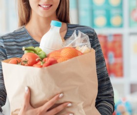 Supermarket ladies with food Stock Photo