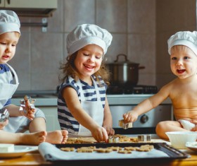 The children who make the biscuits Stock Photo