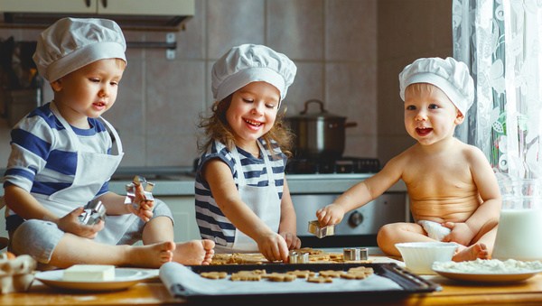 The children who make the biscuits Stock Photo