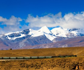 Tibet train and snow-capped mountains HD picture