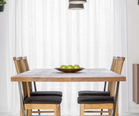 Wooden dining table Stock Photo