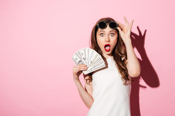 Zhang big mouth woman holding the dollar Stock Photo