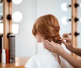 hairdresser who takes care of the hair for the customer Stock Photo 04
