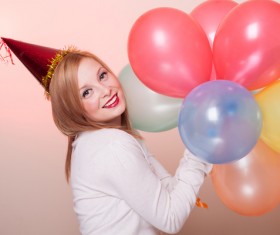 woman holding a balloon Stock Photo