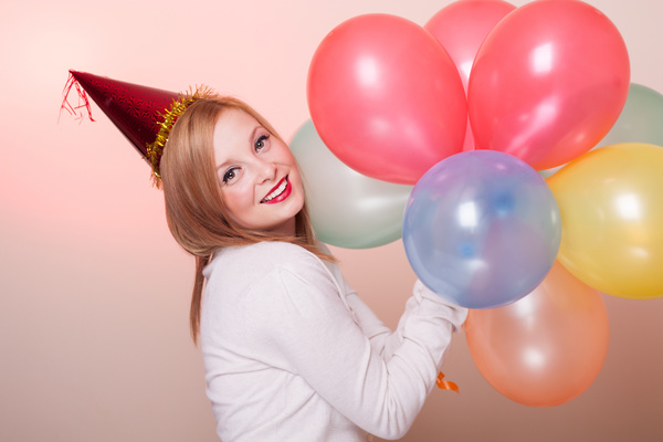 woman holding a balloon Stock Photo