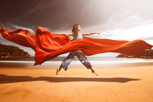 woman who dances red silk on the beach HD picture
