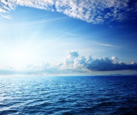 Blue clouds on the sea Stock Photo