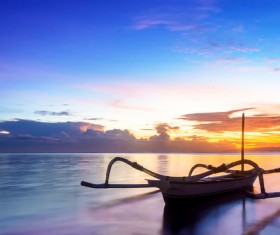 Boat sunset on the lake Stock Photo