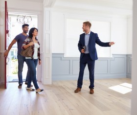 Buy new house couples Stock Photo