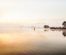 Calm lake sunset scenery Stock Photo