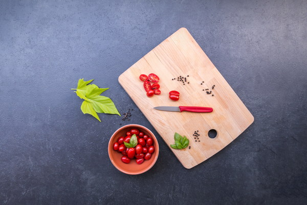 Cherry Tomatoes on the chopping board Stock Photo