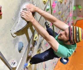 Climbing people in the indoor climbing wall Stock Photo 04