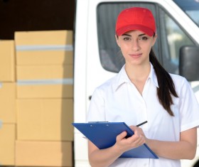 Female courier delivery staff Stock Photo