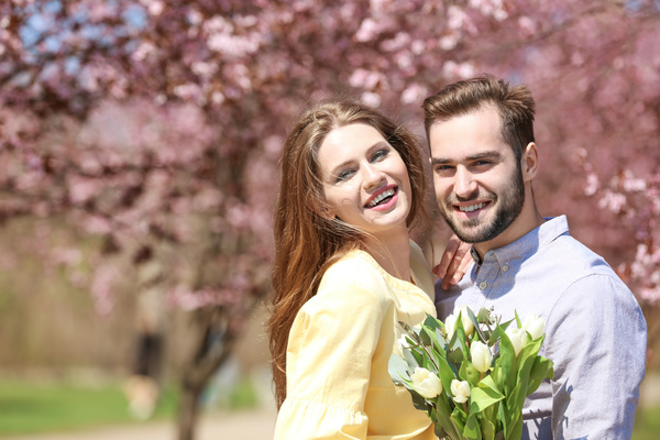 Happy couple in spring park HD picture