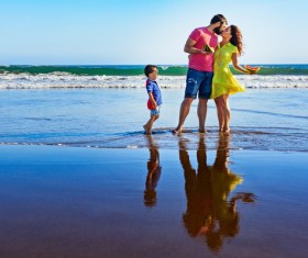 Happy family on the beach HD picture