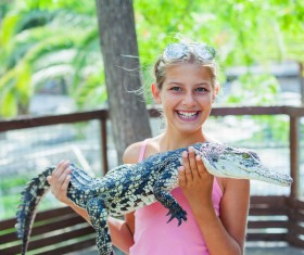 Holding a crocodile child HD picture