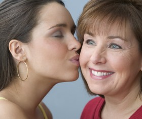 Kiss mother Stock Photo