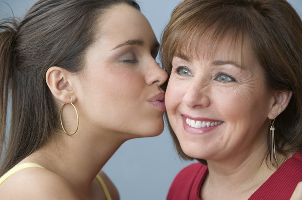 Kiss mother Stock Photo