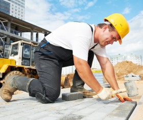 Laying the groundworker Stock Photo