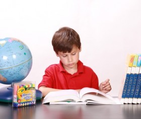Learn to read the boy alone Stock Photo