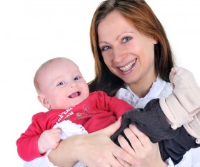 Mother holding a baby Stock Photo