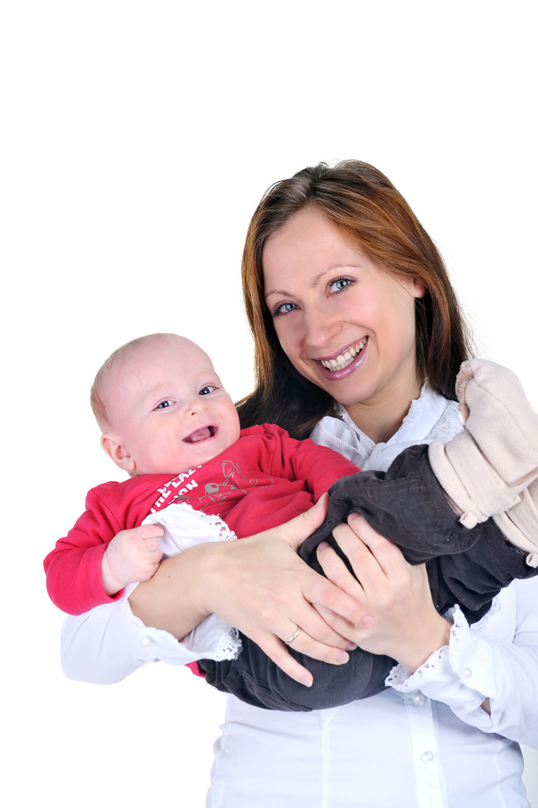 Mother holding a baby Stock Photo
