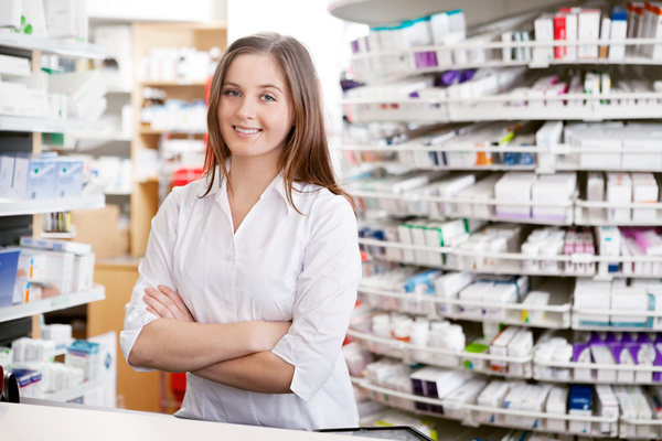 Pharmacy working woman Stock Photo