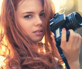 Photography-loving girl Stock Photo