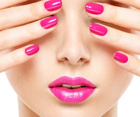 Pink nails and pink lipstick makeup girl Stock Photo