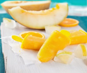 Put the sticks and fruit on the chopping board Stock Photo