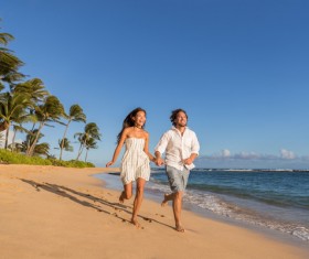 Seaside happy couple Stock Photo