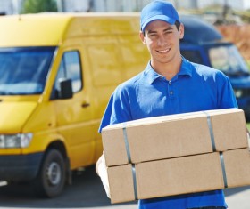 Smiling express courier Stock Photo