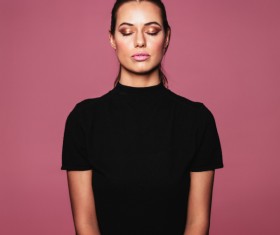 Standing Woman with eyes closed HD picture