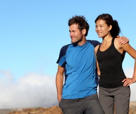 Standing together overlooking the distant couple Stock Photo