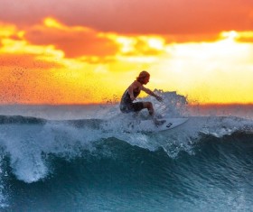 Surfing man Stock Photo