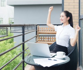 Terrace happy woman Stock Photo