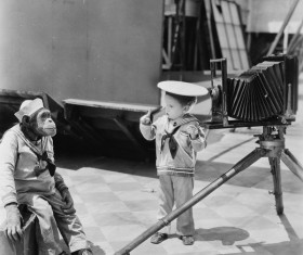 The children who take pictures of the monkeys Stock Photo