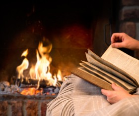 The fireplace reading Stock Photo